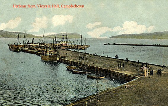 An old colour postcard of the Old Quay taken from the Victoria Hall